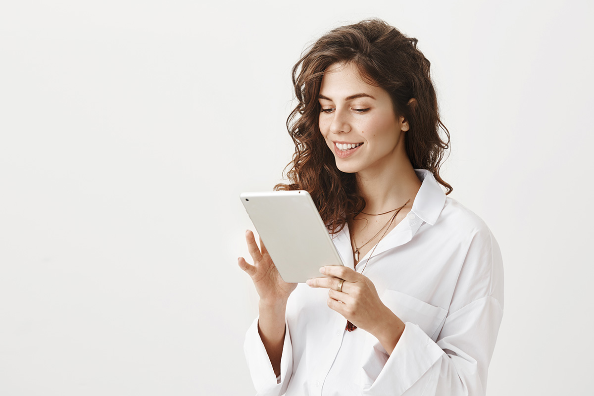 Confident therapist managing her practice with Oliviaapp